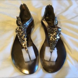 Woman’s silver flash sandals